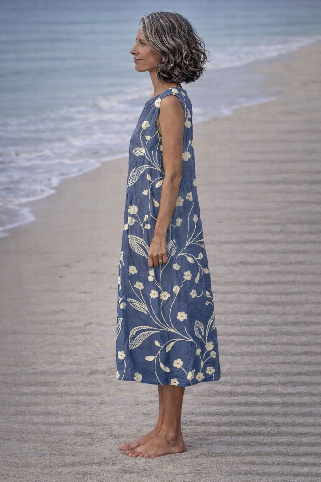 Estela | Vestido midi sin mangas con flores vintage