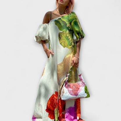 Skylar - Maxi vestido con estampado floral, escote asimétrico y mangas abullonadas