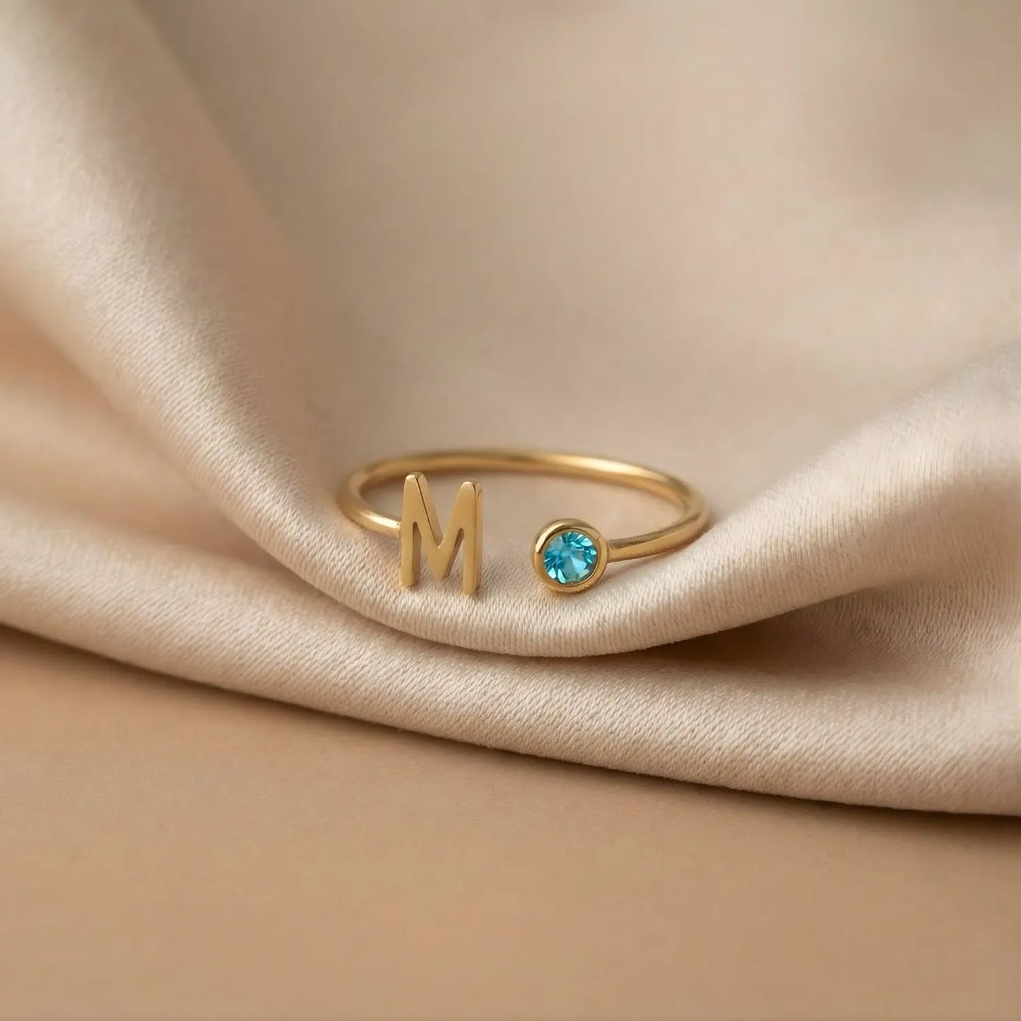 ANILLO CON INICIAL ABIERTO CON CIRCONITA