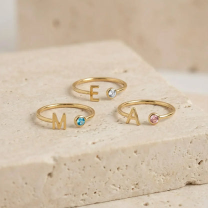 ANILLO CON INICIAL ABIERTO CON CIRCONITA