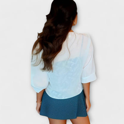 Olivia - Blusa con parte delantera abierta