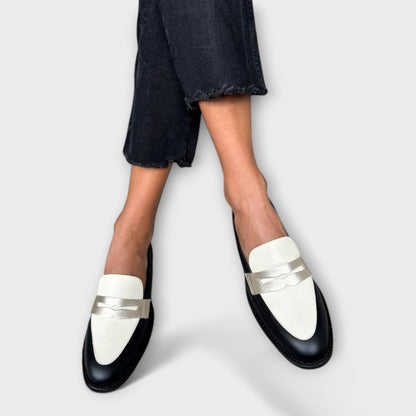 Xara – Mocasines negros con brillo metálico