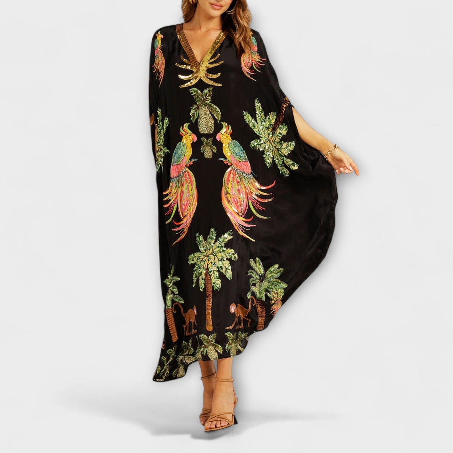 Linda - Impresionante vestido con tirantes asimétricos y estampado de palmeras